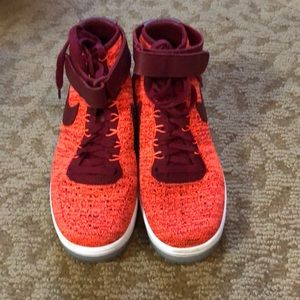 Nike neon orange high high tops